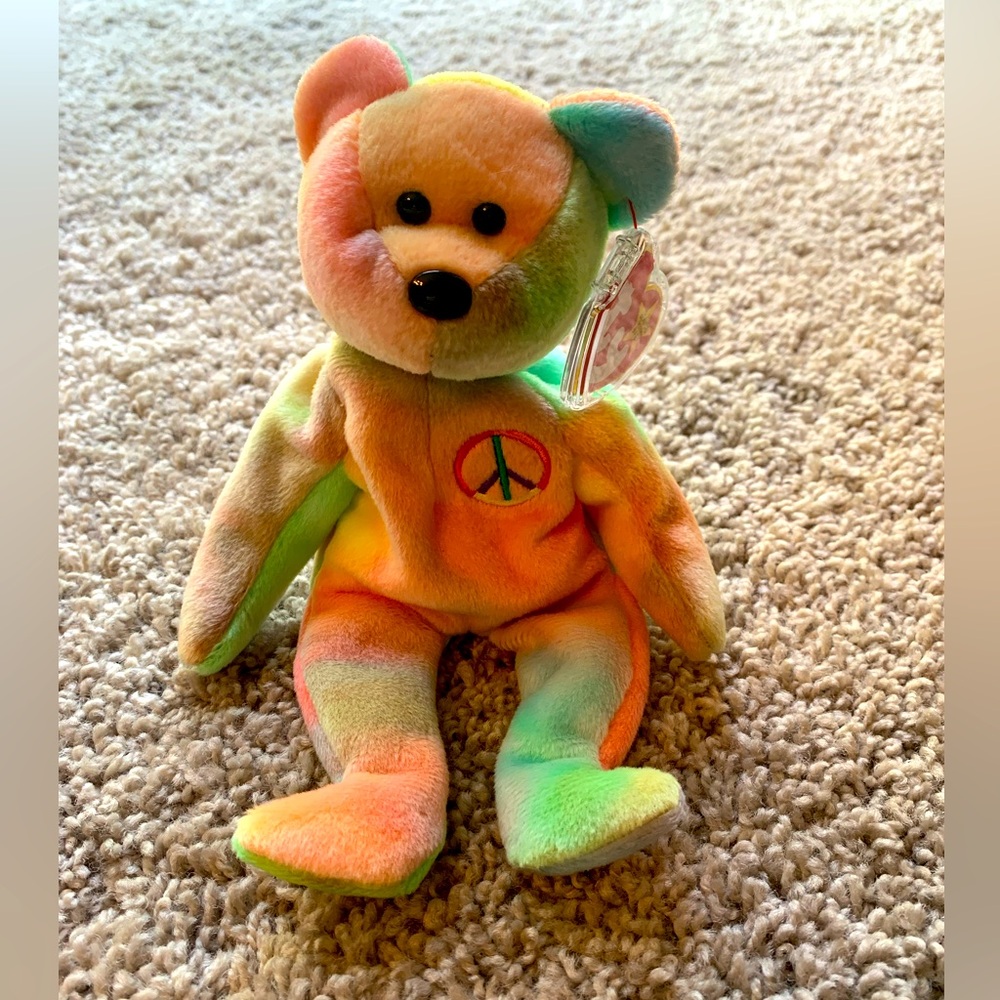 Peace Ty Beanie Baby with tag protector. Excellent condition.